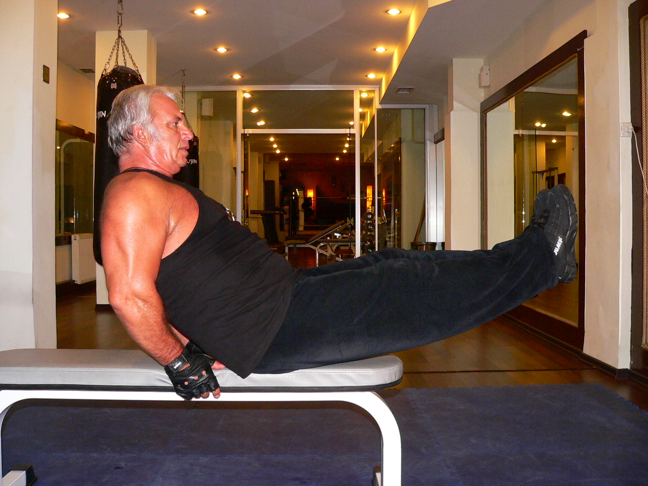 Seated Flat Bench Leg Pull – In