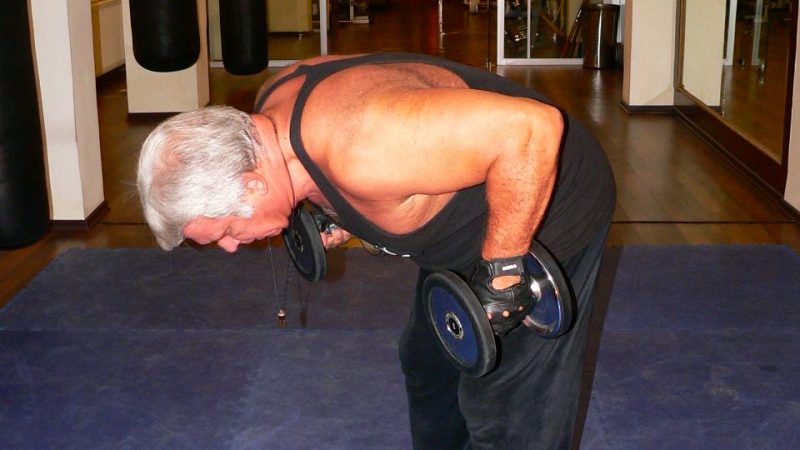 Standing Bent-Over Two-Arm Dumbbell Triceps Kick Back